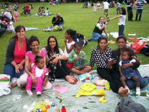 Nathalie with mothers and chldren during their summer holiday scheme for refugees