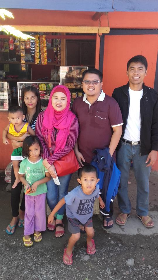 The author, Elbert Balbastro (center), with members of his host Meranao family and with his fellow Columban seminarian, Jerry A Lohera, in Sigayan, Lanao del Norte, Philippines